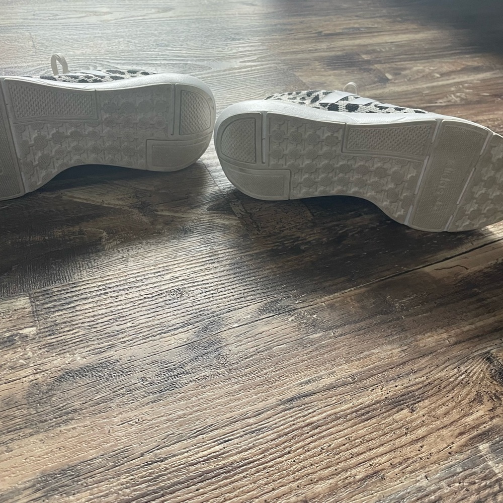 Worn once. Size 7, fits like 8.5.